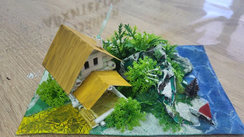 Макет домика у воды на ландшафте